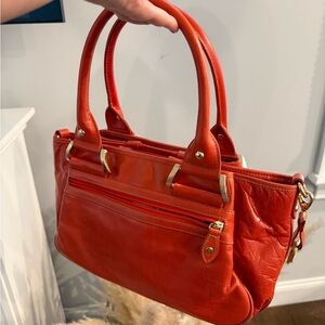 Barr Barr Orange  Leather Handbag with the gold hardware